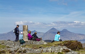 Scottish cruise guests on Sgurr of Eigg shore trip