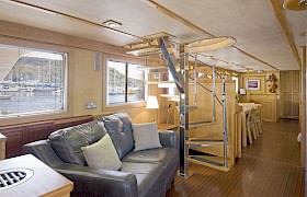 Deck saloon with stairs to wheelhouse
